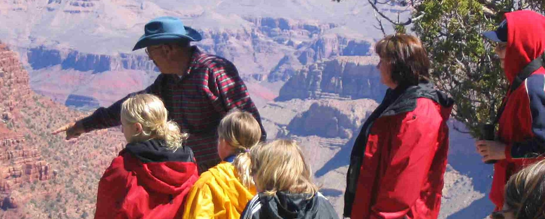 Happy guests on grand canyon south rim 
            tours